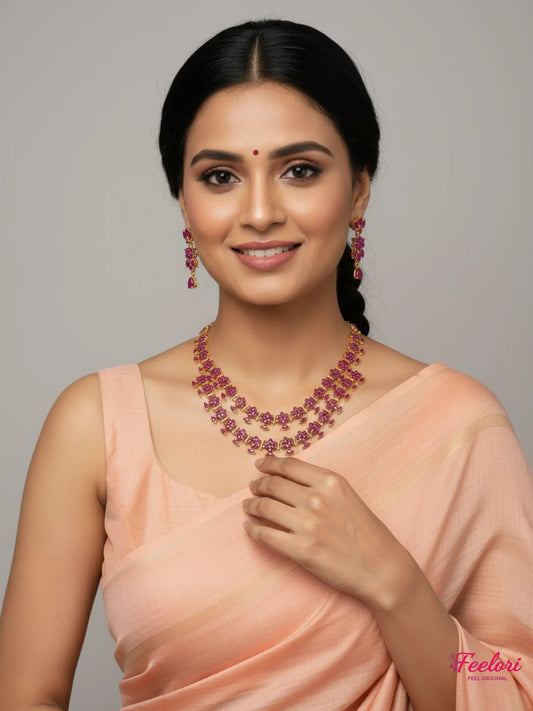 FeelOri Gold Plated Ruby Necklace Set - Model wearing elegant tiered floral set with traditional saree.