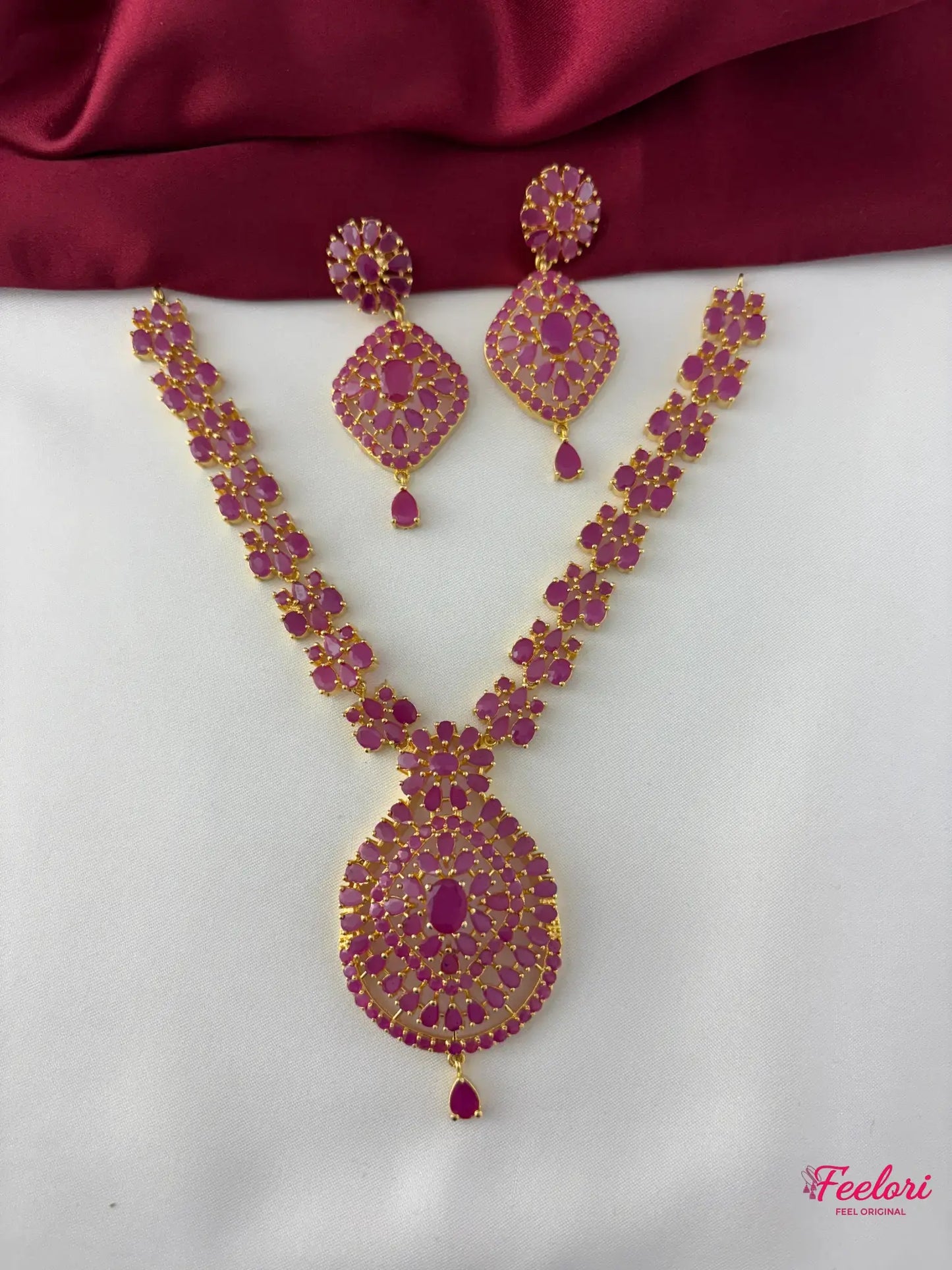 FeelOri Gold Plated Ruby Petal Cluster Necklace Set - Front view showcasing the grand bloom necklace and matching earrings with genuine rubies.