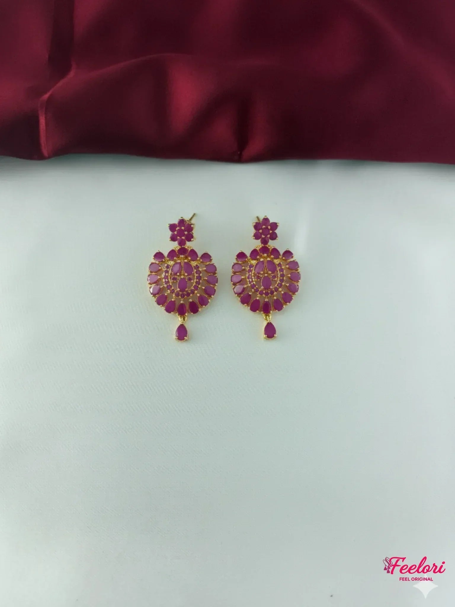 FeelOri Gold Plated Ruby Flower Bloom Earrings - Detailed view of the matching earrings with their ornate ruby-toned stone settings.