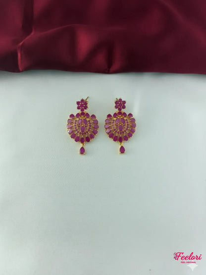 FeelOri Gold Plated Ruby Flower Bloom Earrings - Detailed view of the matching earrings with their ornate ruby-toned stone settings.