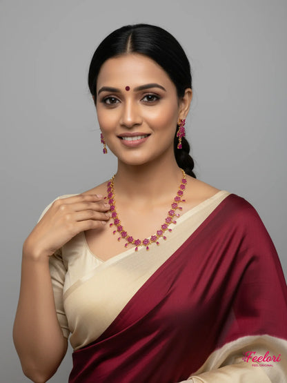 FeelOri Gold Plated Ruby Flower Necklace Set - Model wearing festive set with traditional saree.