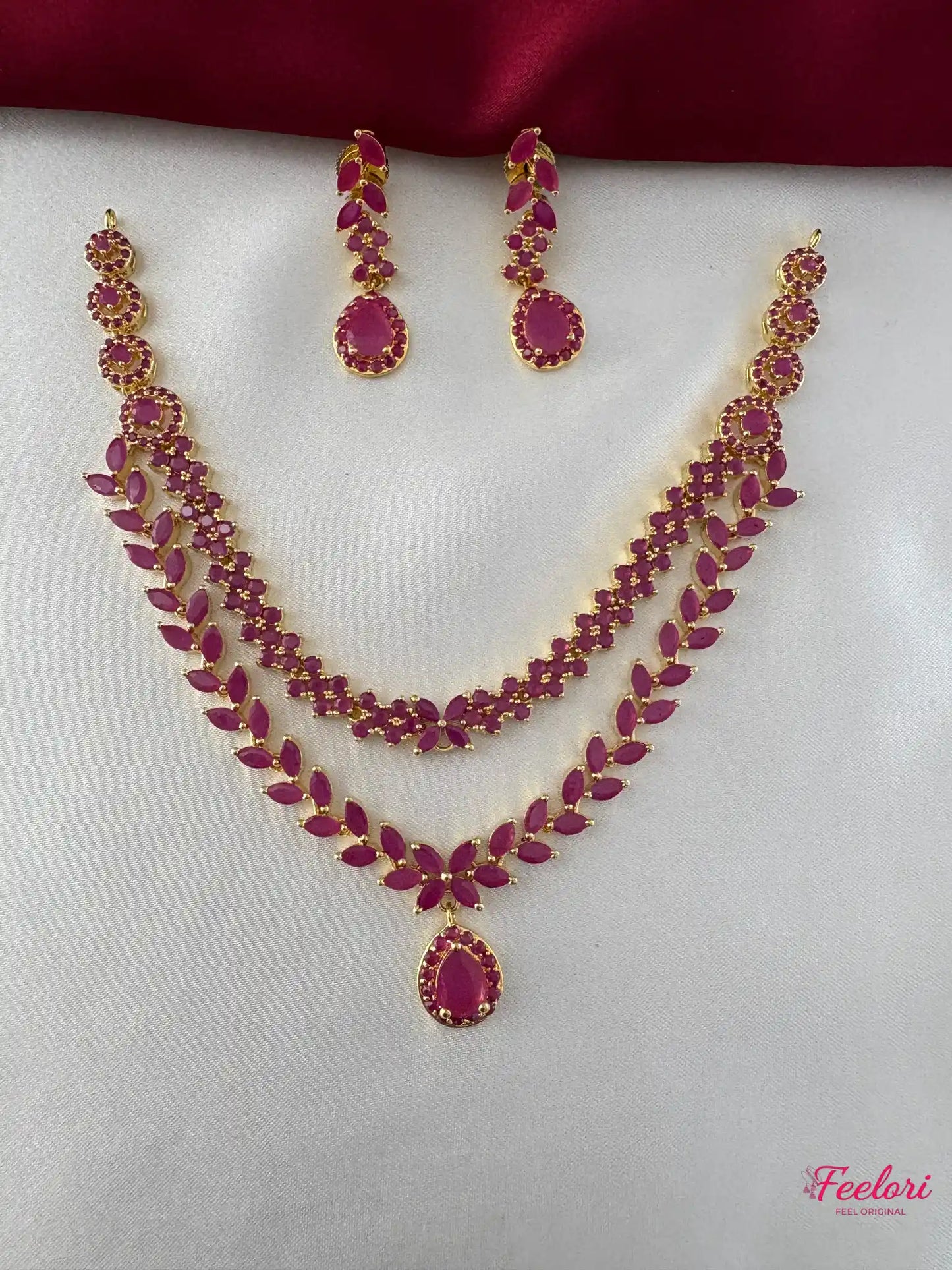 FeelOri Gold Plated Ruby Leaf Necklace Set - Front view showcasing the dual-layer necklace with teardrop pendant and matching earrings.