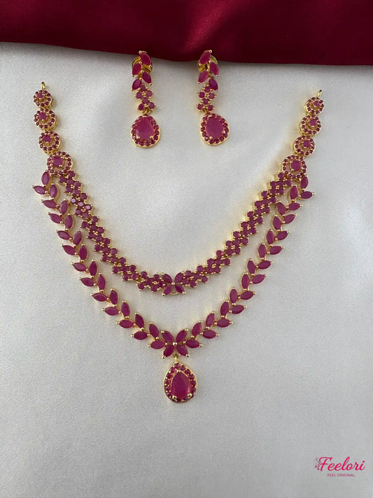 FeelOri Gold Plated Ruby Leaf Necklace Set - Front view showcasing the dual-layer necklace with teardrop pendant and matching earrings.