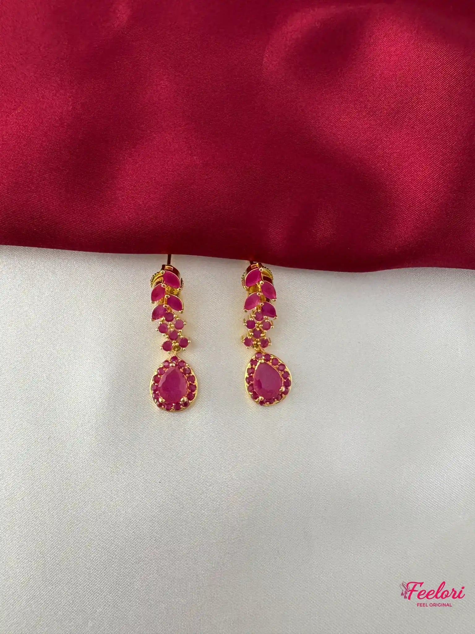 FeelOri Gold Plated Ruby Leaf Earrings - Close-up view of the matching drop earrings with genuine ruby-hued stones and secure push-back closure.