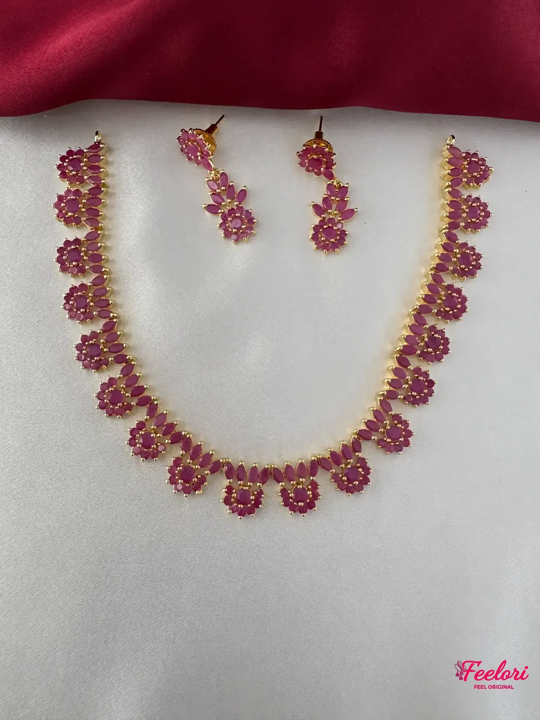 FeelOri Gold Plated Ruby Marquis Necklace Set - Front view showcasing the complete necklace and matching earrings with intricate petal clusters.