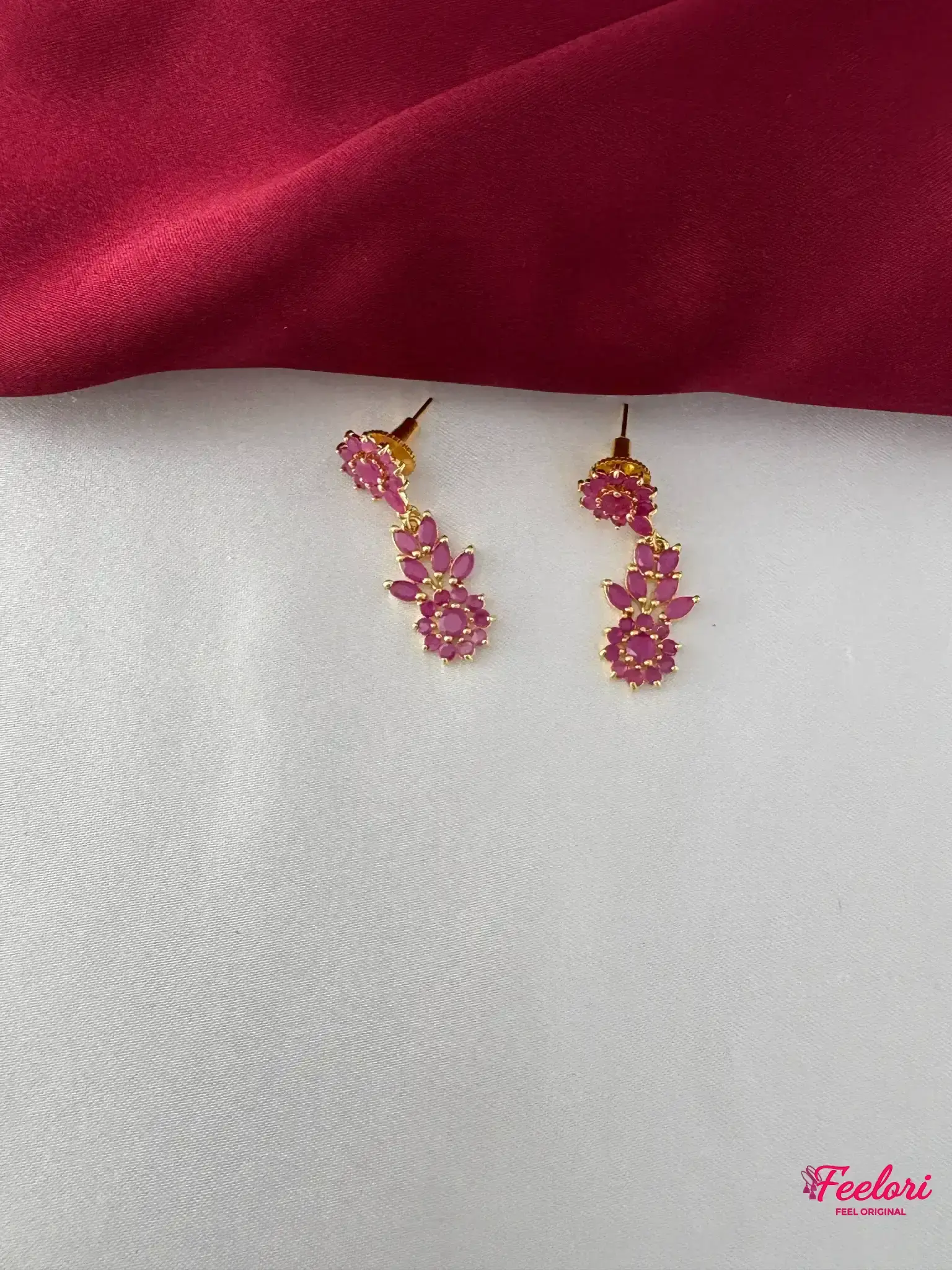 FeelOri Gold Plated Ruby Marquis Earrings - Detailed close-up of the drop earrings featuring Ruby-Tone CZ marquis stones arranged in a delicate floral pattern.