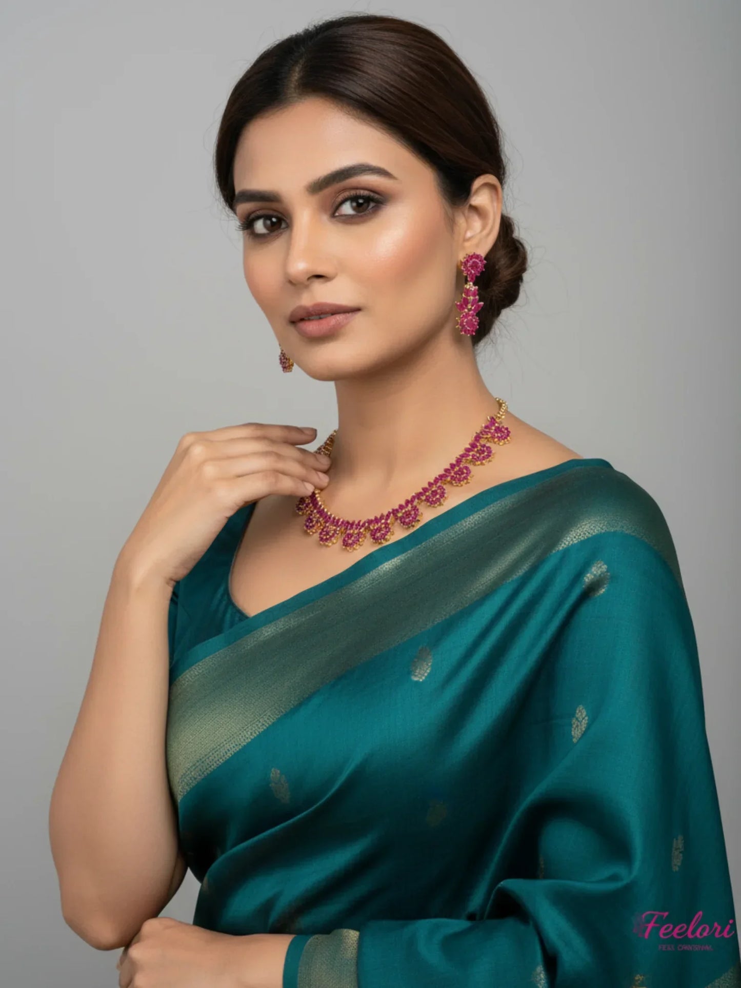 FeelOri Gold Plated Ruby Necklace Set - Model wearing elegant set with traditional saree in festive setting