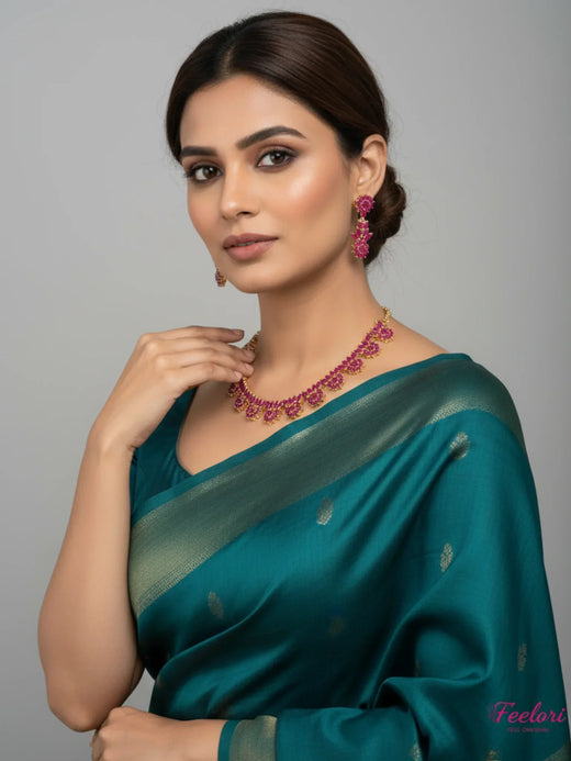 FeelOri Gold Plated Ruby Necklace Set - Model wearing elegant set with traditional saree in festive setting