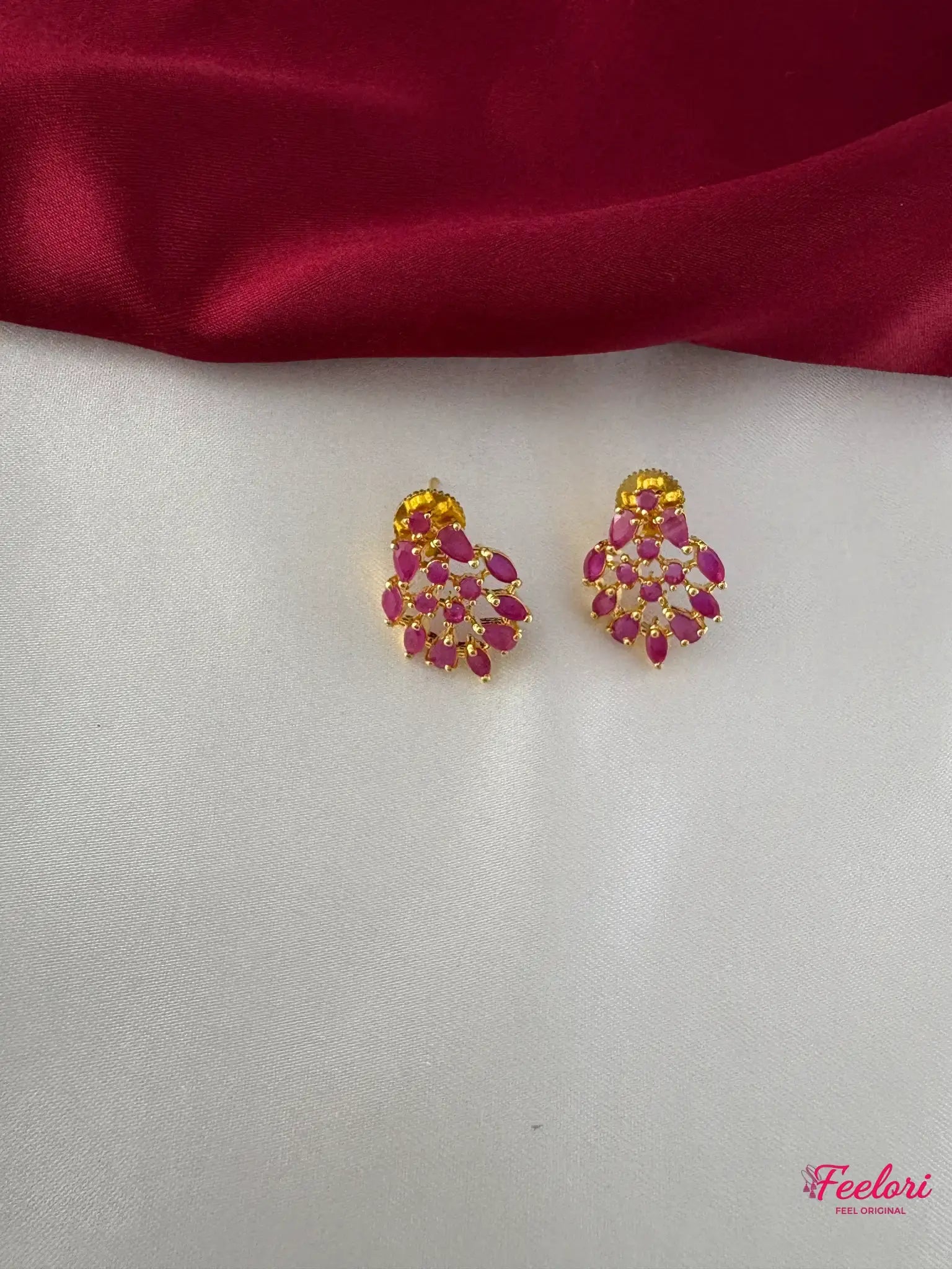 FeelOri Gold Plated Ruby Marquise Petal Earrings - Close-up view highlighting the detailed craftsmanship and vibrant ruby-hued stones.