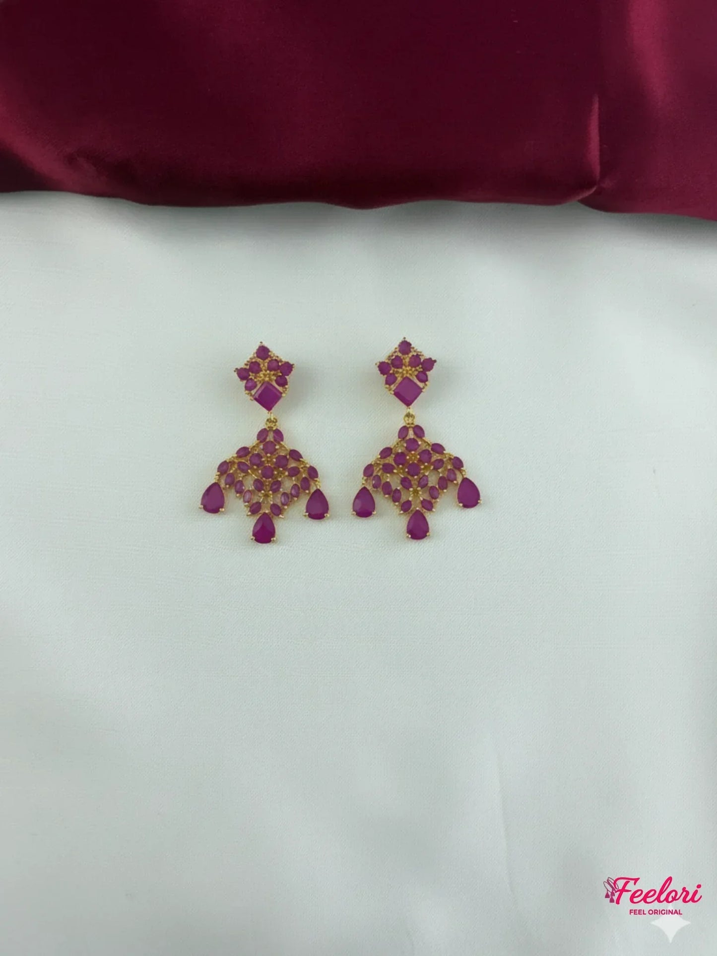 FeelOri Gold Plated Ruby Petal Cluster Earrings - Detailed view highlighting the individual square and teardrop genuine ruby-hued stones and push-back closure.