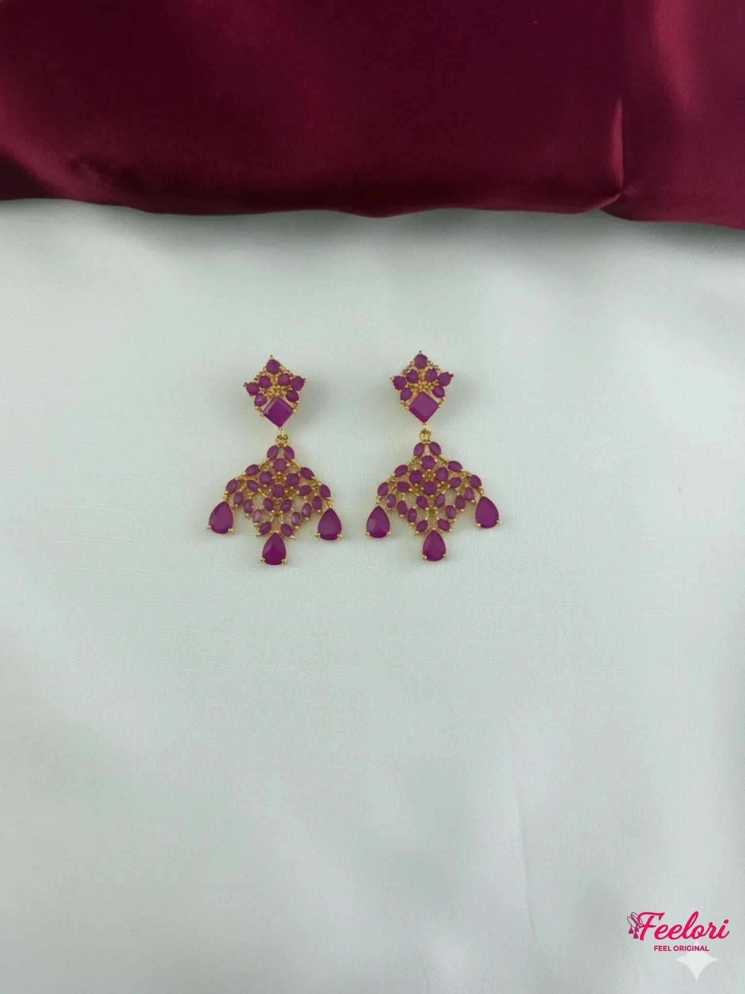 FeelOri Gold Plated Ruby Petal Cluster Earrings - Detailed view highlighting the individual square and teardrop Ruby-Tone CZ-hued stones and push-back closure.