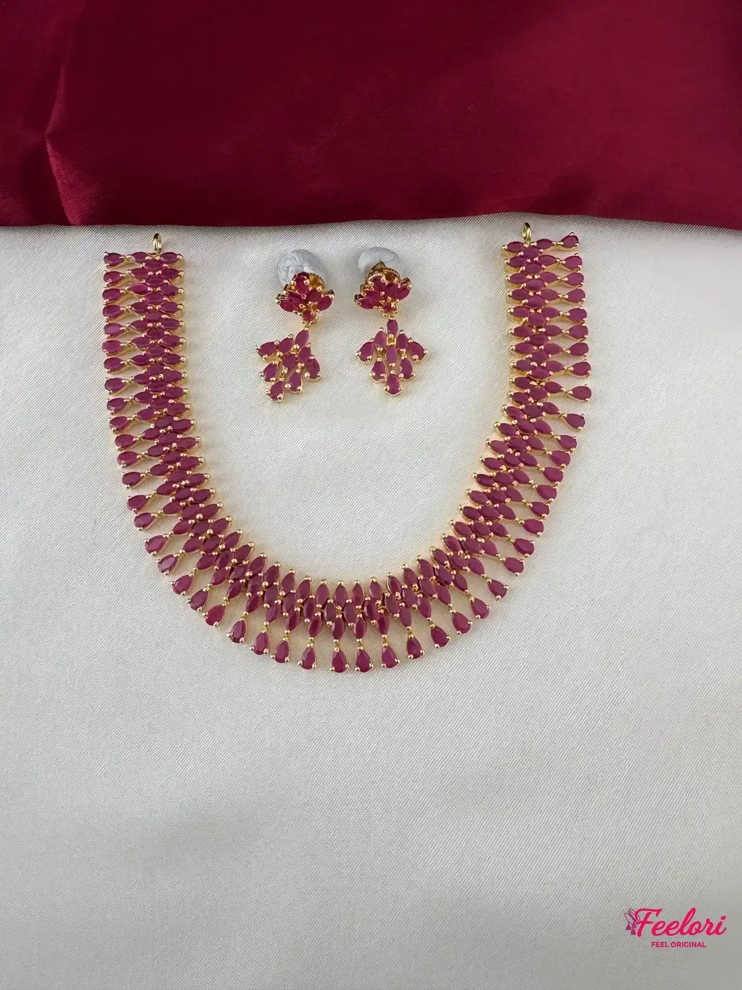 FeelOri Gold Plated Ruby Petal Necklace Set - Front view showcasing the complete set with necklace and matching earrings.