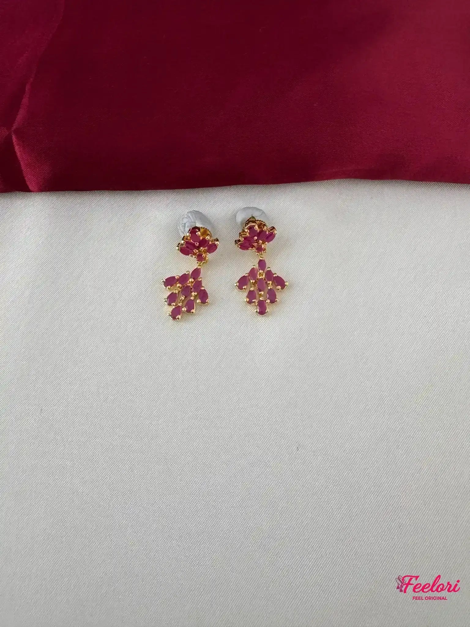 FeelOri Gold Plated Ruby Petal Earrings - Close-up view highlighting the intricate petal arrangement of Ruby-Tone CZ stones on the earrings.