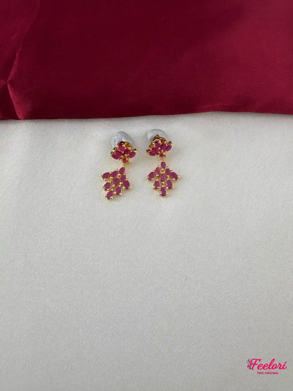 FeelOri Gold Plated Ruby Petal Earrings - Close-up view highlighting the intricate petal arrangement of genuine ruby stones on the earrings.