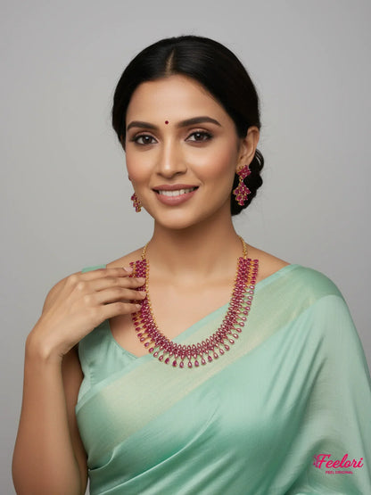 FeelOri Gold Plated Ruby Petal Necklace Set - Model wearing festive elegance with traditional saree