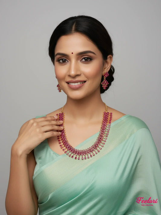 FeelOri Gold Plated Ruby Petal Necklace Set - Model wearing festive elegance with traditional saree