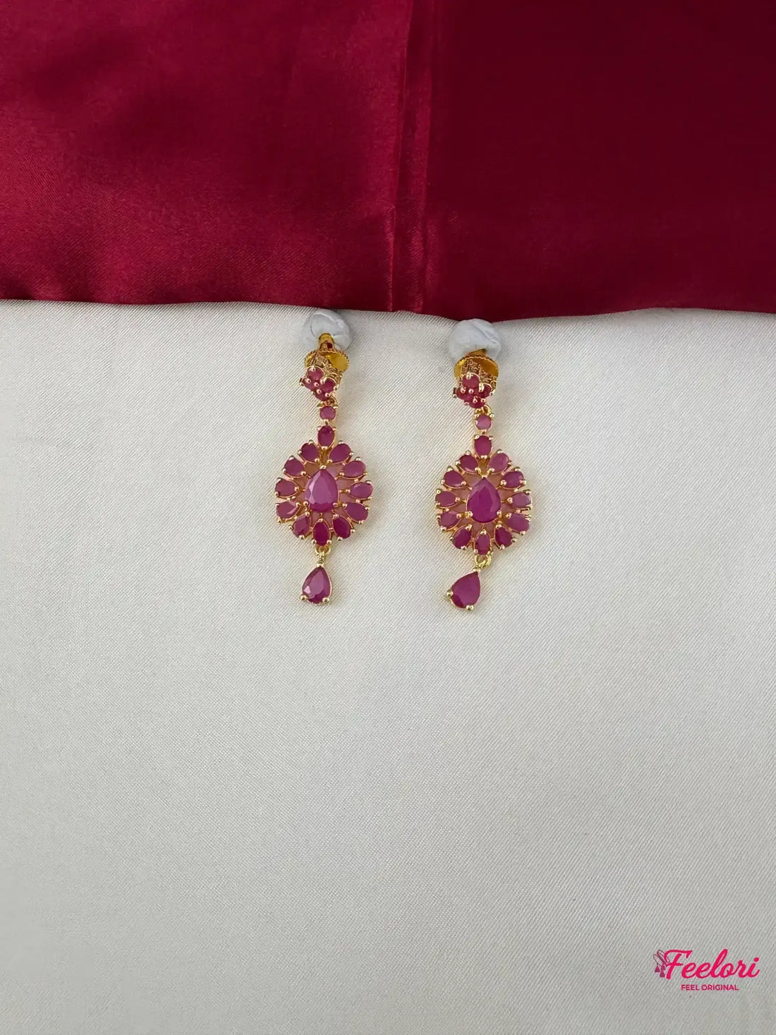 FeelOri Gold Plated Ruby Petal Earrings - Detailed view of the drop earrings, highlighting the Ruby-Tone CZ stones in their elegant petal formation.