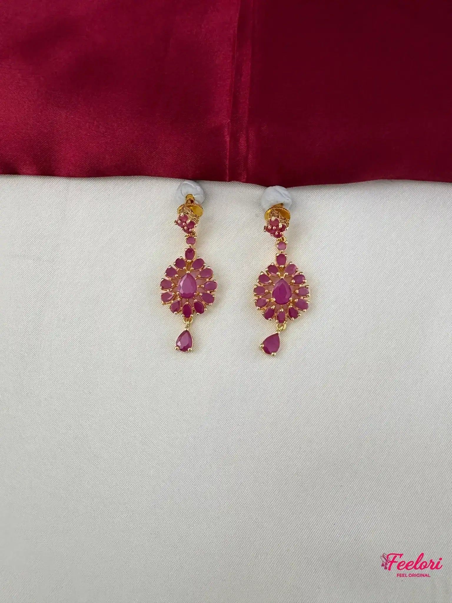 FeelOri Gold Plated Ruby Petal Earrings - Detailed view of the drop earrings, highlighting the Ruby-Tone CZ stones in their elegant petal formation.