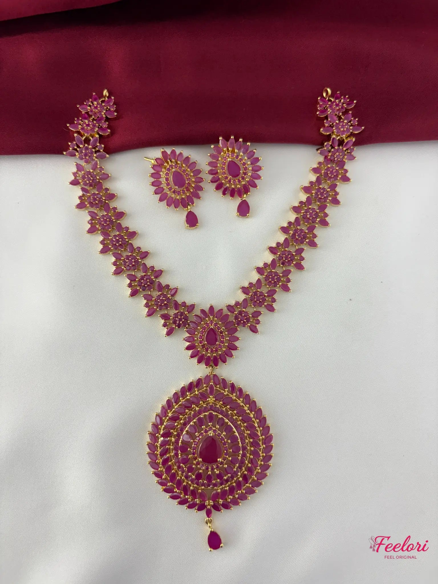 FeelOri Gold Plated Ruby-Tone Petal Necklace Set - Circular Pendant Design - FeelOri Indian fashion jewellery view 1