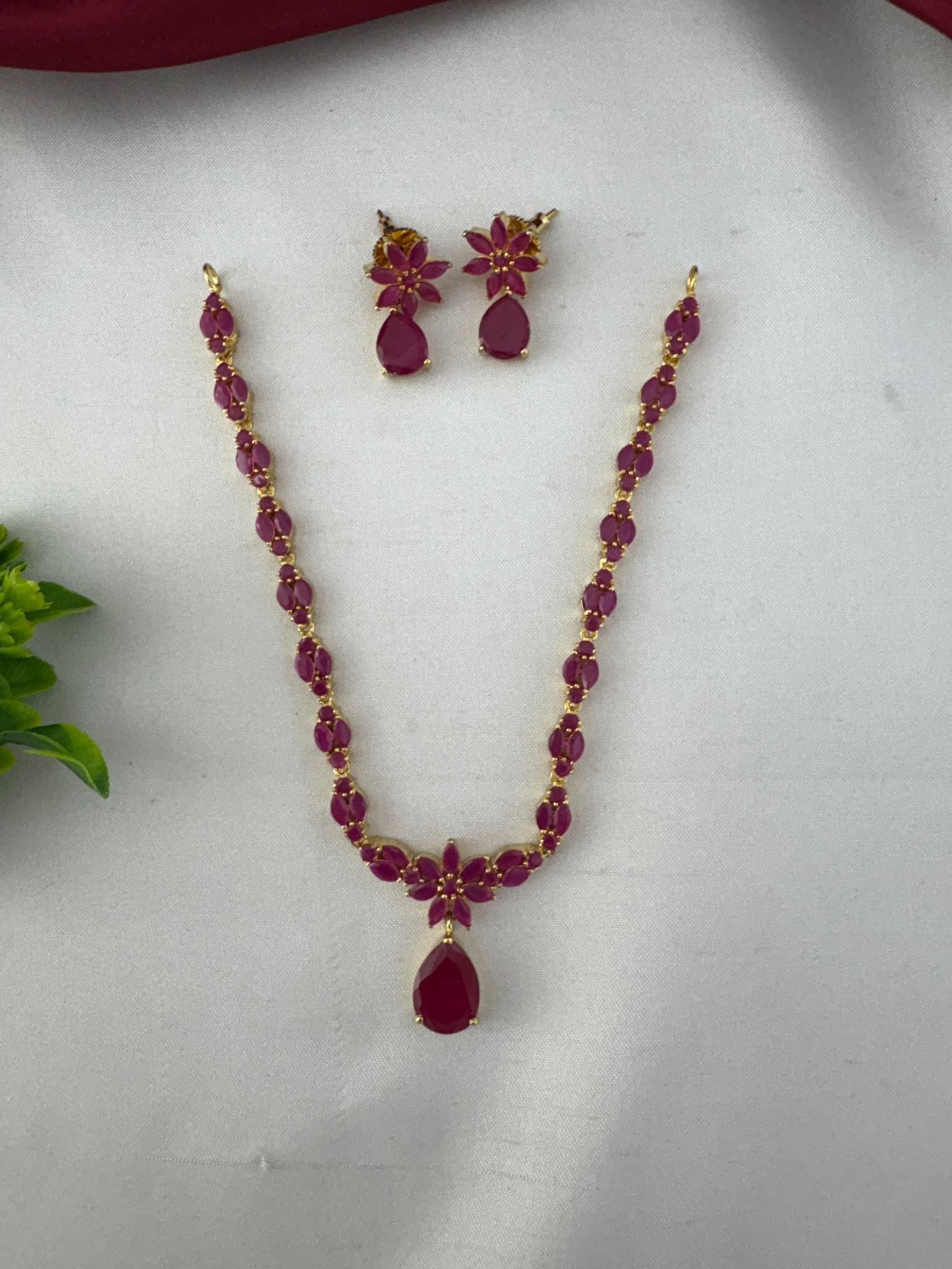 FeelOri Heritage Ruby-Tone CZ Short Necklace Set - Clear angled view of the ruby necklace and matching earrings.