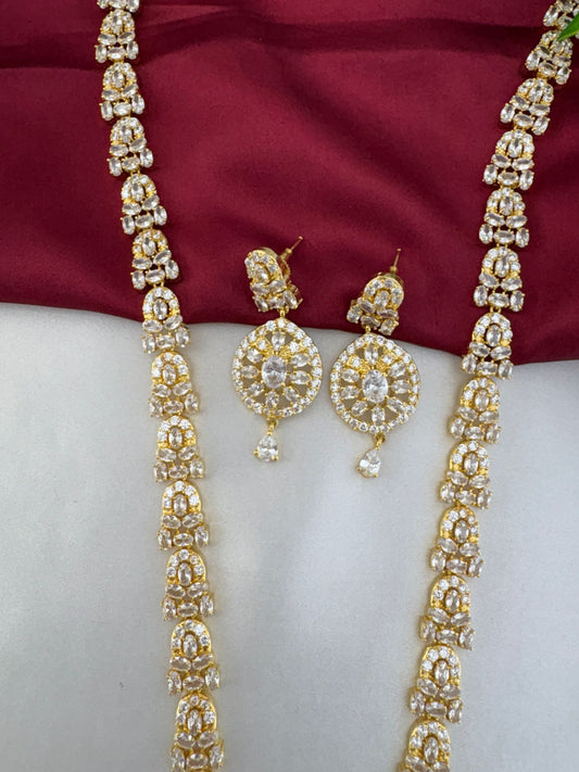 Detailed close-up of FeelOri Luminous Cascade White AD Necklace chain and earring design.