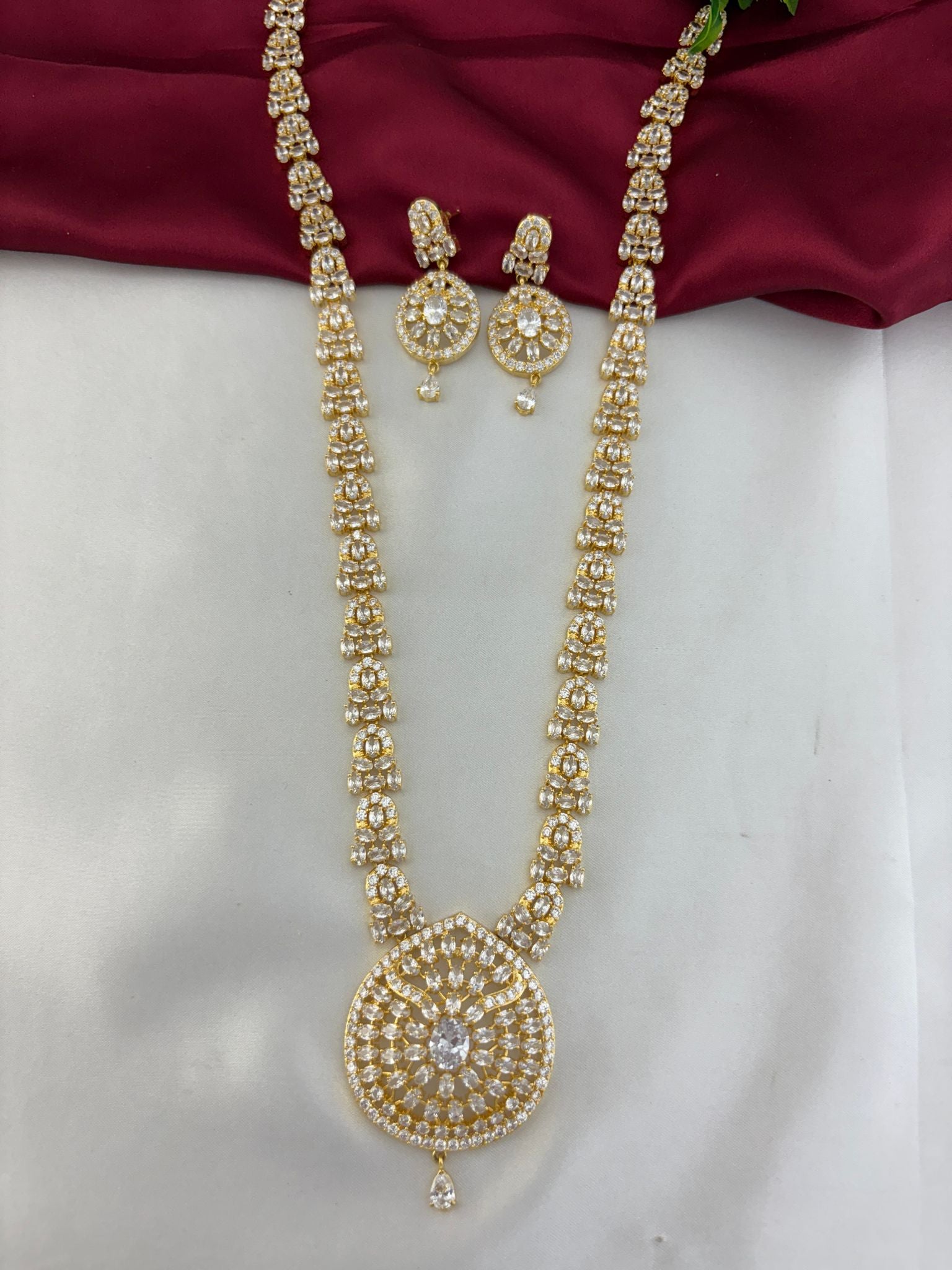 FeelOri Luminous Cascade White AD Long Necklace and Earring Set - Full jewelry set displayed.