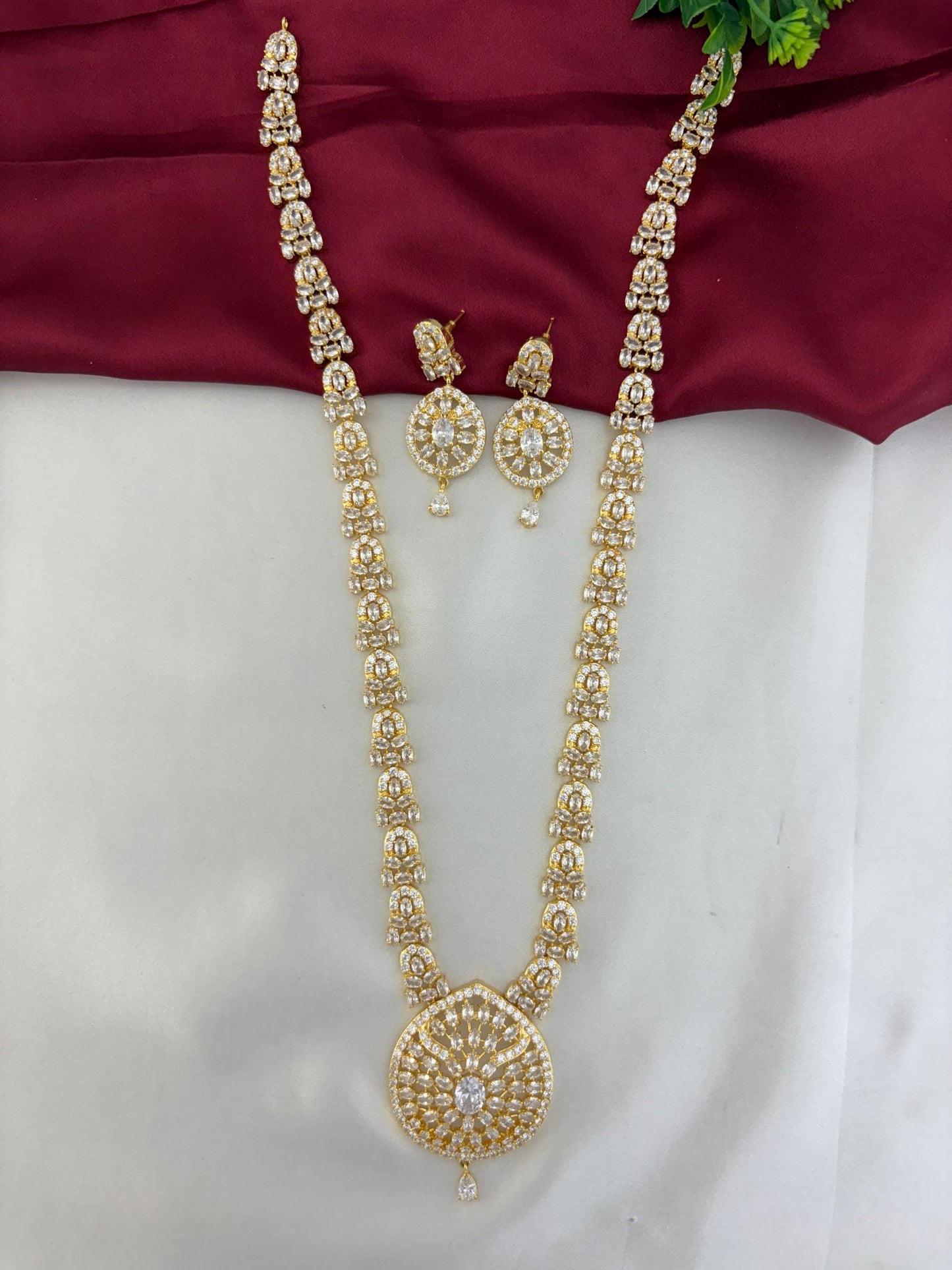 FeelOri Luminous Cascade White AD Long Necklace Set showcasing the pendant design and matching earrings.