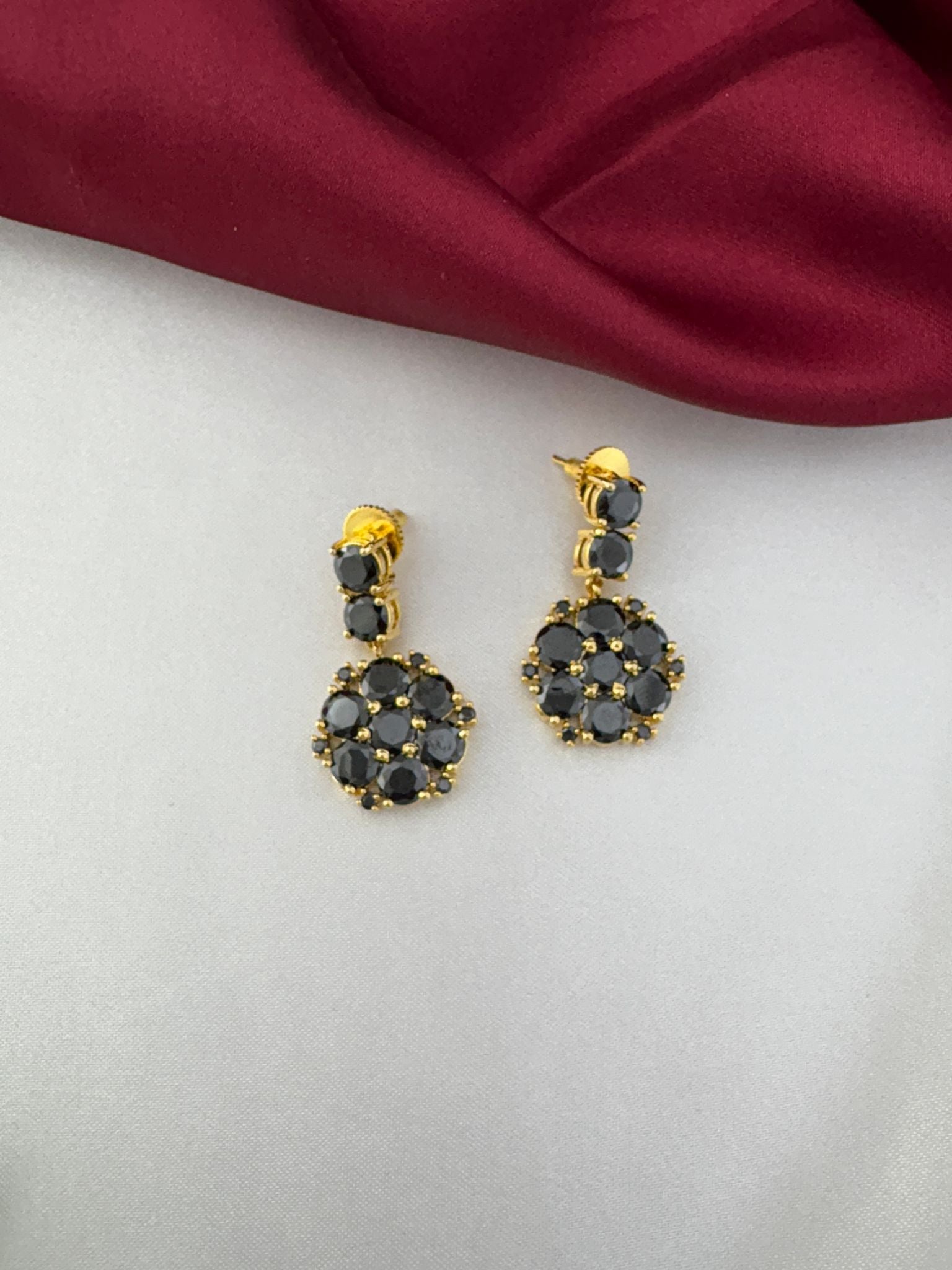 Detailed close-up of FeelOri Midnight Glam Black AD earrings. Part of the short choker set for evening wear by feelori.