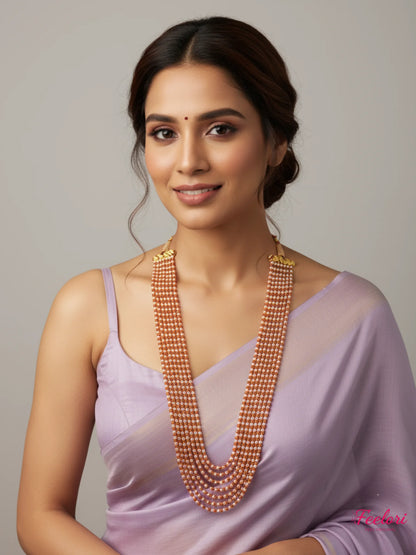 FeelOri Gold Plated CZ Beaded Mala - Model wearing multilayered necklace with lilac saree, smiling softly