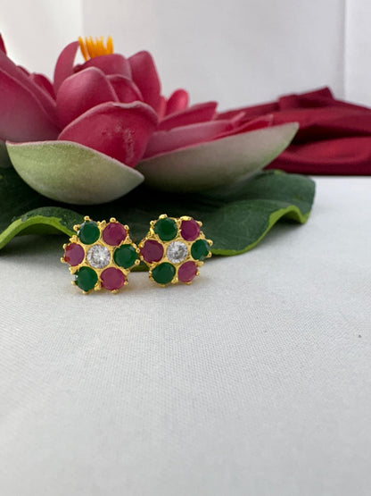 FeelOri mystic garden earthy jewel tone AD studs styled with lotus creating enchanted forest magical appeal