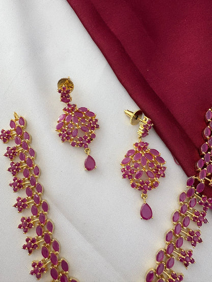 Detailed view of the FeelOri Temple Design on the Original Ruby Short Necklace and Earrings, showing authentic craftsmanship by feelori.