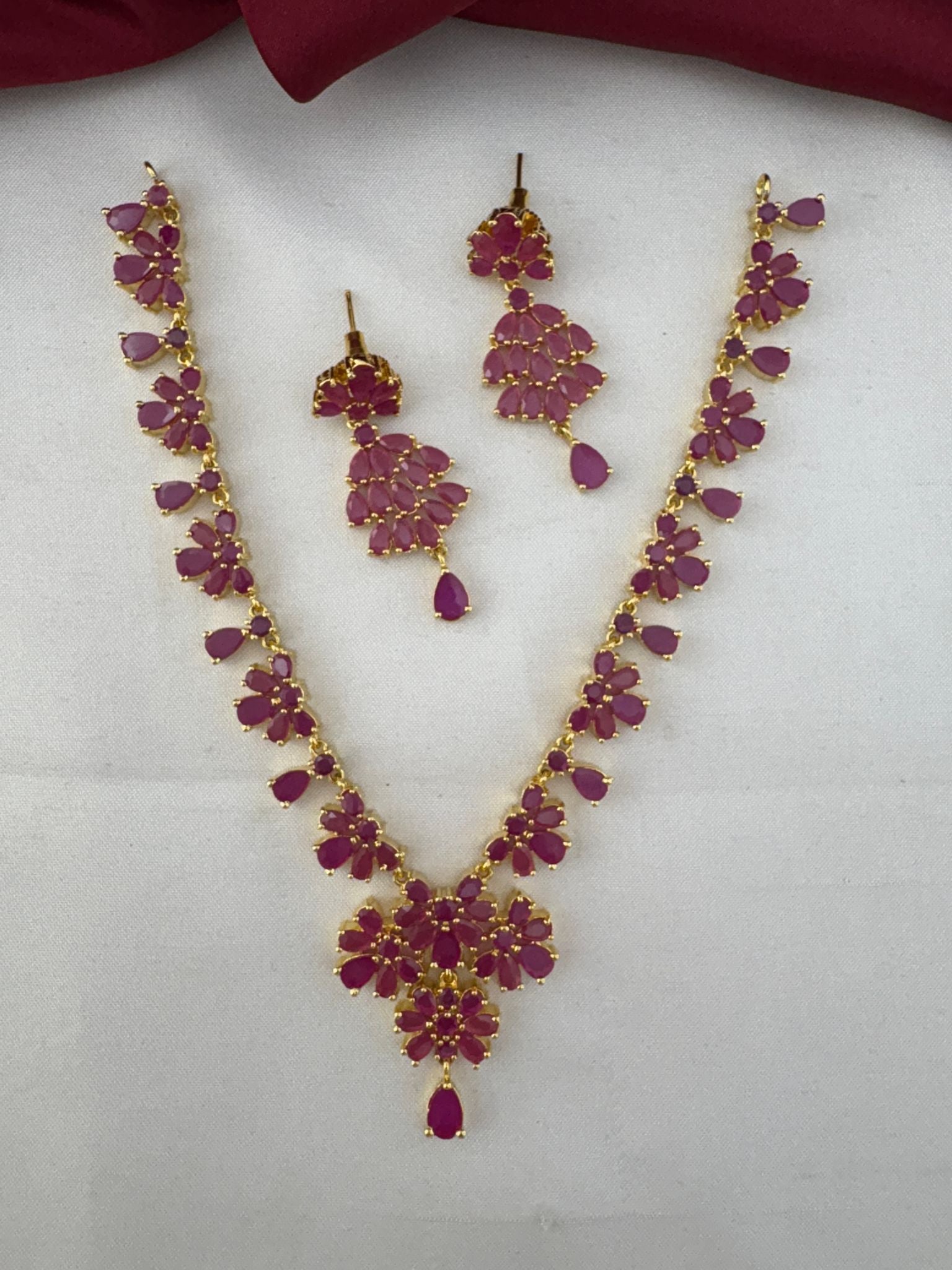 FeelOri Party Wear Ruby-Tone CZ Short Necklace Set - Alternate full view of necklace and earrings, slightly spread.