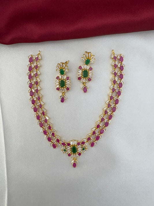 FeelOri Pastel Dreams Multi-Color AD Short Necklace Set with earrings, displayed on fabric.