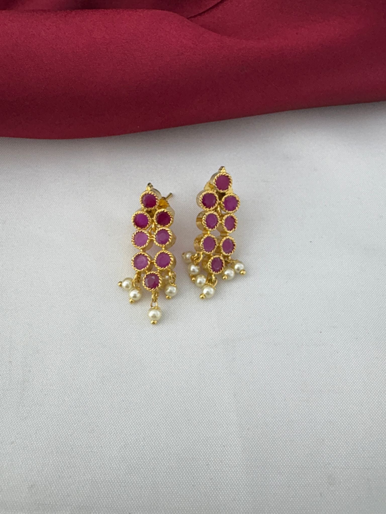 feelori Radiant Ruby-Tone CZ Short Necklace Set - Detailed view of ruby and pearl earrings