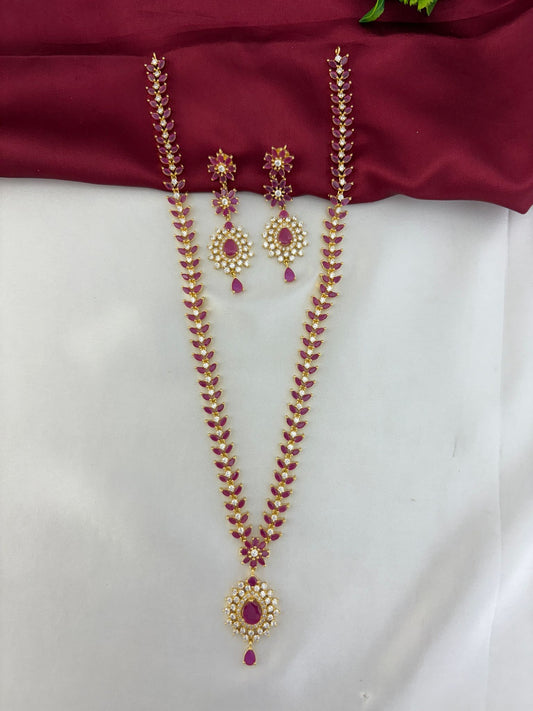 Overhead display of the FeelOri Regal Ruby Bloom AD Cluster Long Necklace and Earring Set.