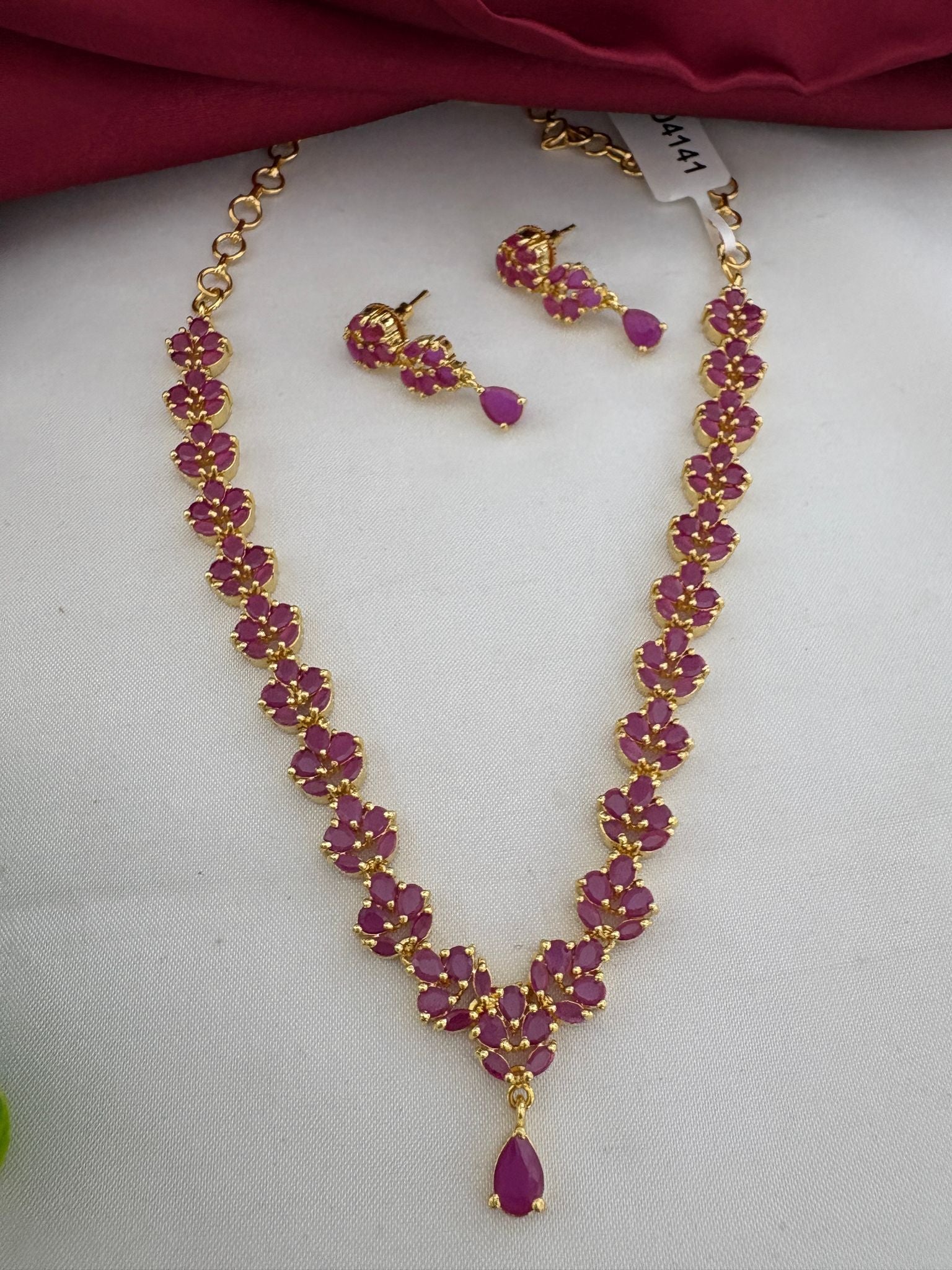 FeelOri Regal Ruby-Tone CZ Pendant Short Necklace Set with earrings - Full view, ideal for Chennai weddings.