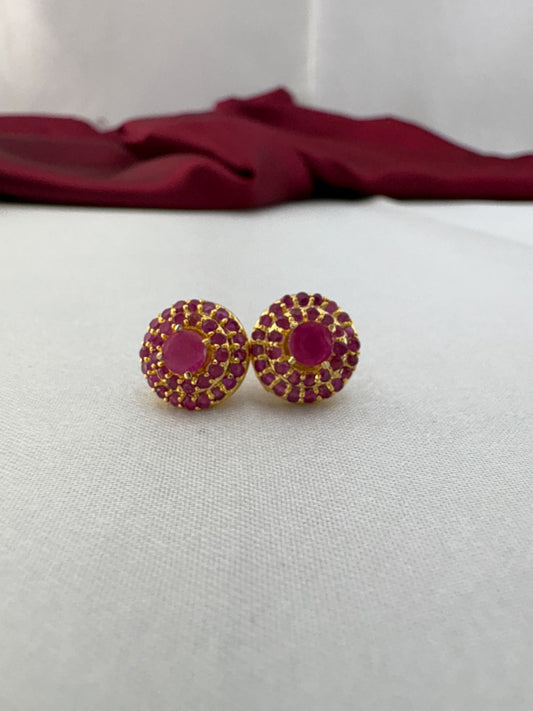 FeelOri Rose Bloom pink AD stud earrings pair on white fabric featuring romantic pink stones in floral cluster