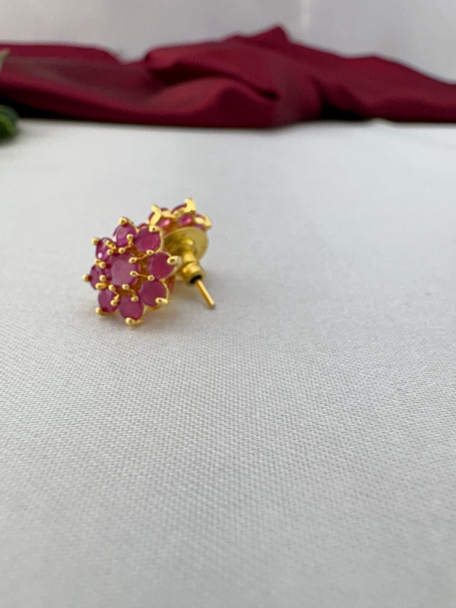 FeelOri Rose Quartz translucent pale pink AD studs angled view showing gold post construction and comfortable back
