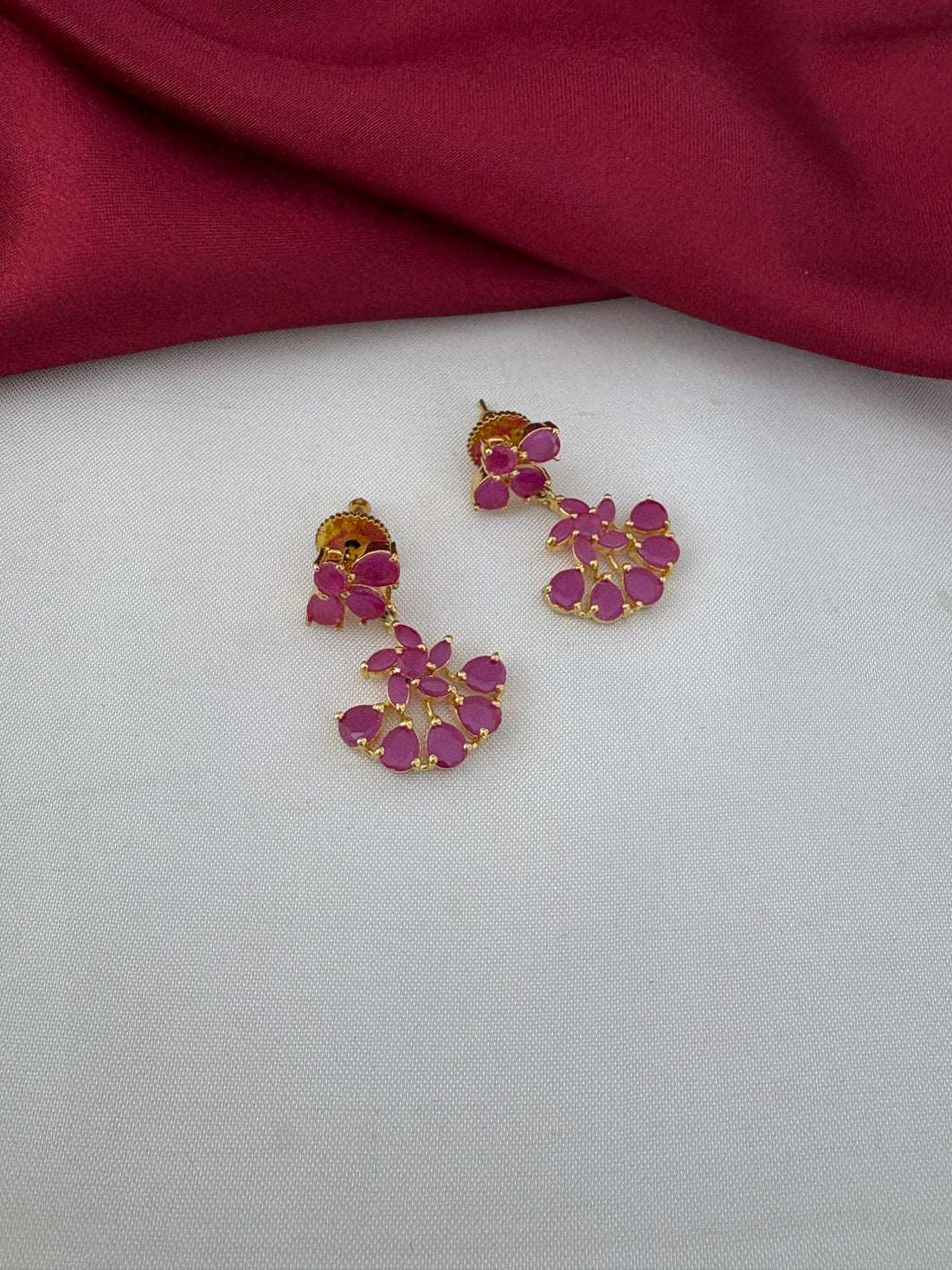 FeelOri Exclusive Ruby-Tone CZ Short Necklace Set - Designer Wear - Detailed close-up of ruby earrings.