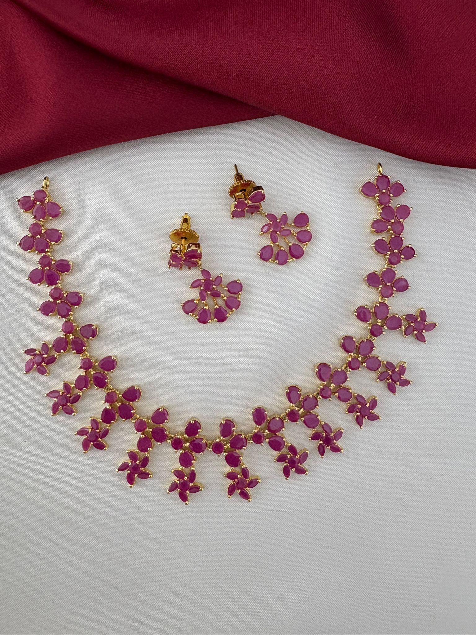FeelOri Exclusive Ruby-Tone CZ Short Necklace Set - Designer Wear - Main view with necklace and earrings.