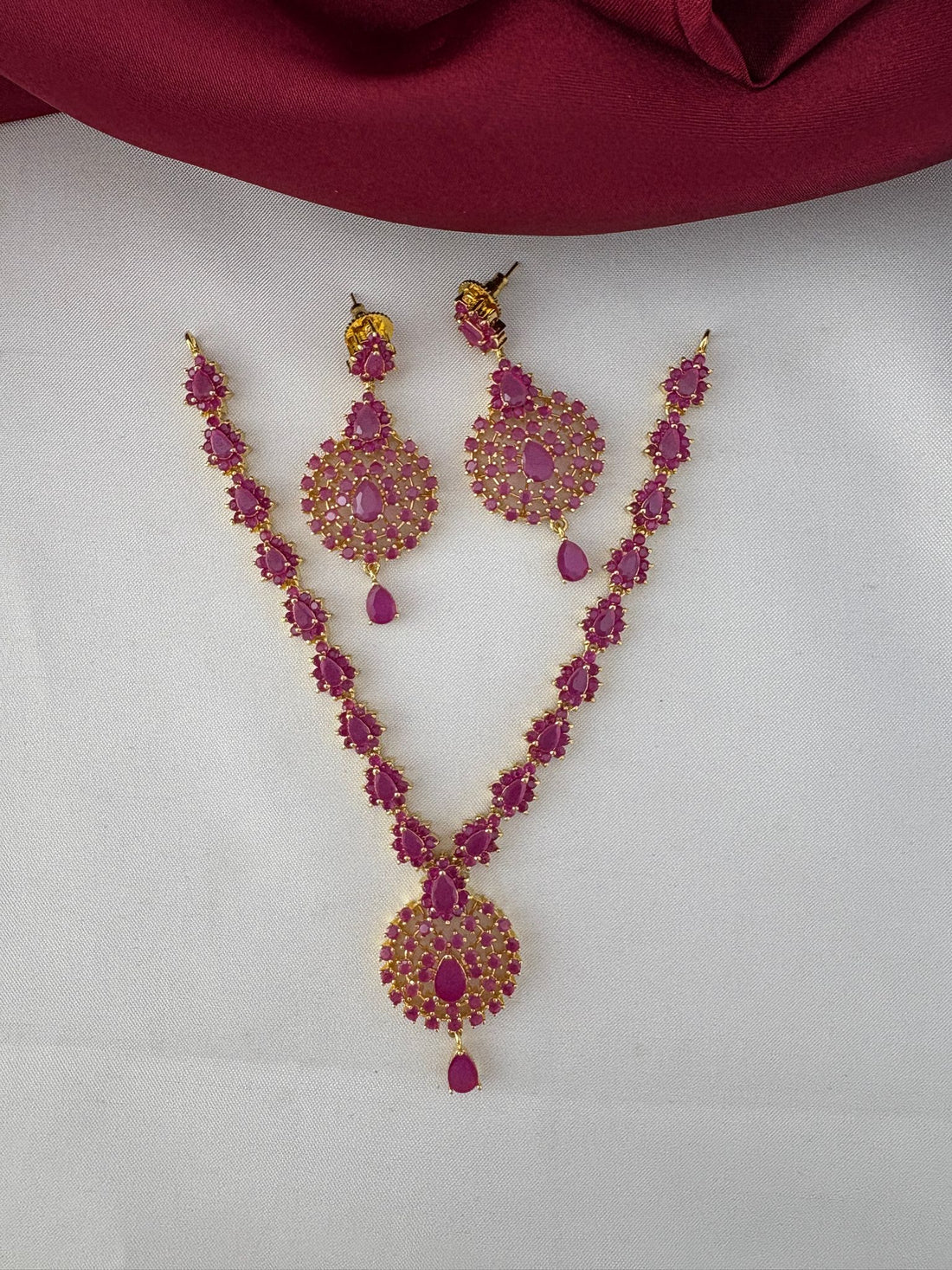 FeelOri Luxury Ruby-Tone CZ Short Necklace Set - Premium South Indian Design. Front view of the complete ruby necklace and earring set.