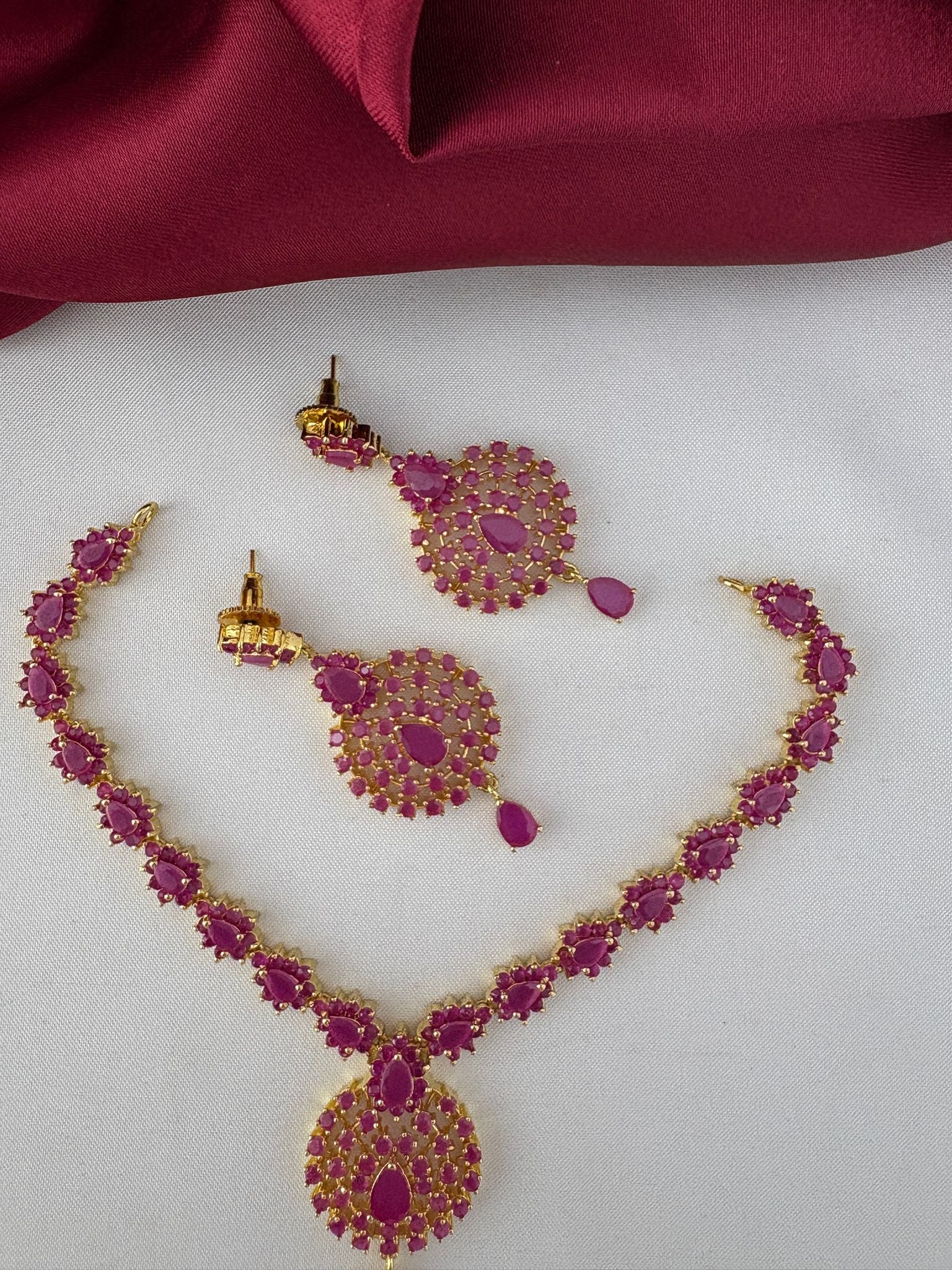 FeelOri Ruby-Tone CZ Short Necklace Set - Necklace and earrings displayed showing full length and design.
