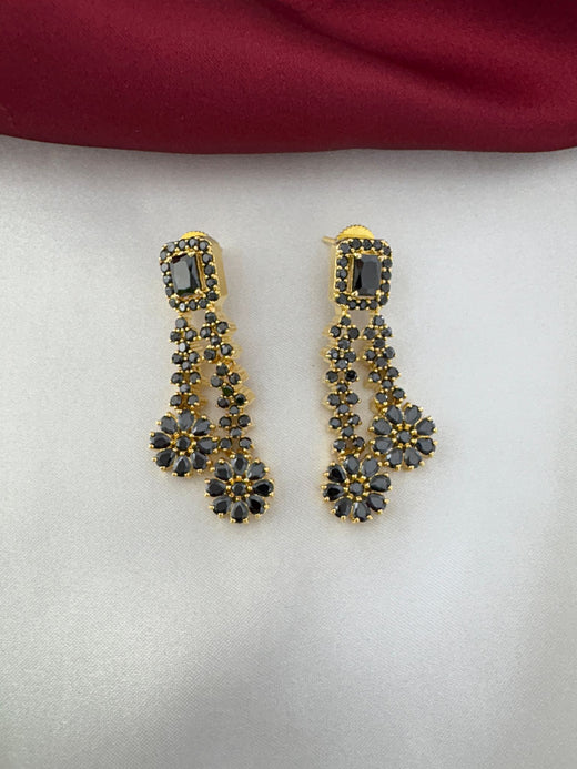 Detailed view of FeelOri Shadow Bloom Black AD Floral Earrings from the necklace set by feelori.