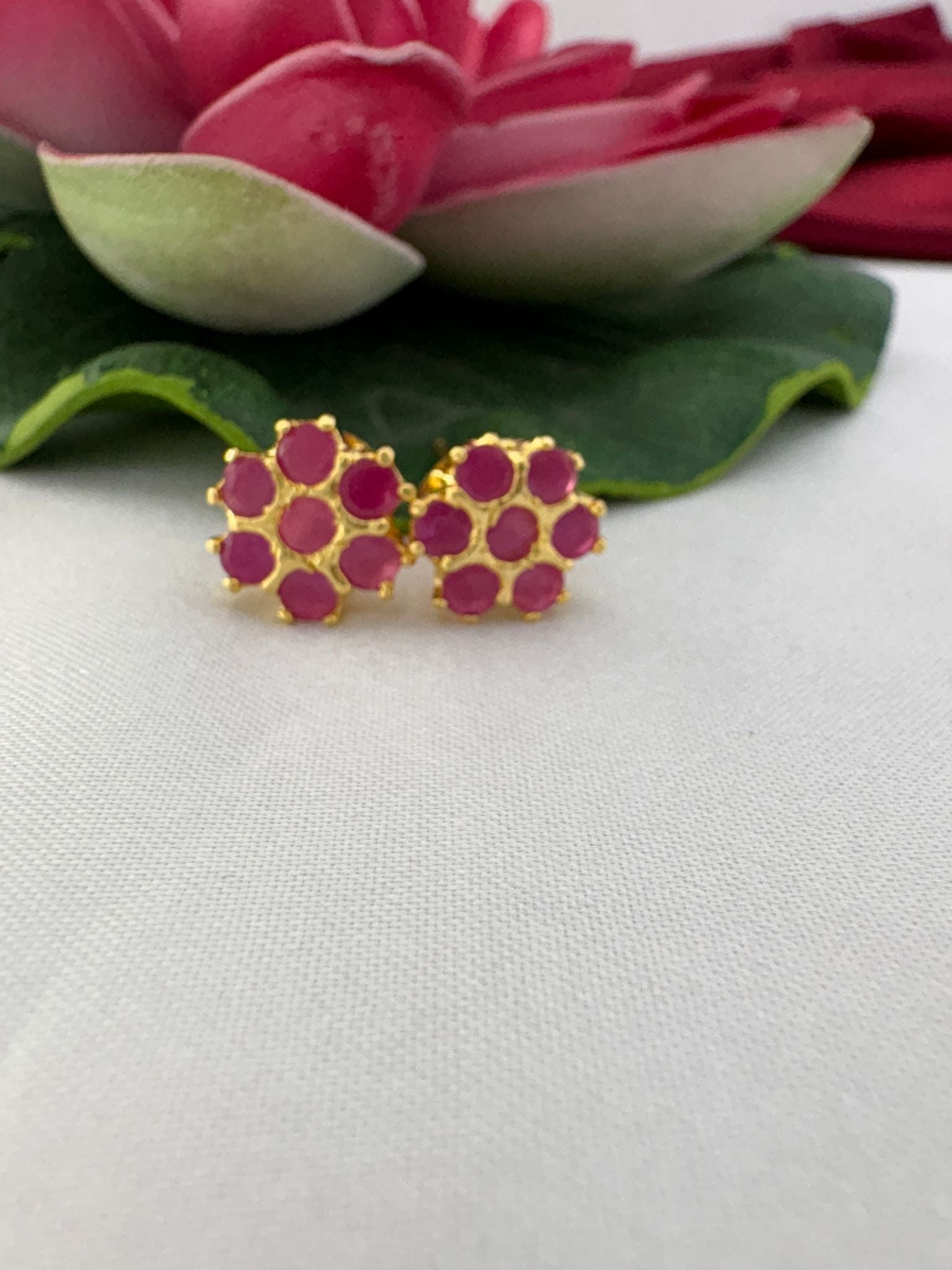 FeelOri soft peony pink AD stud earrings styled with lotus creating romantic feminine floral harmony