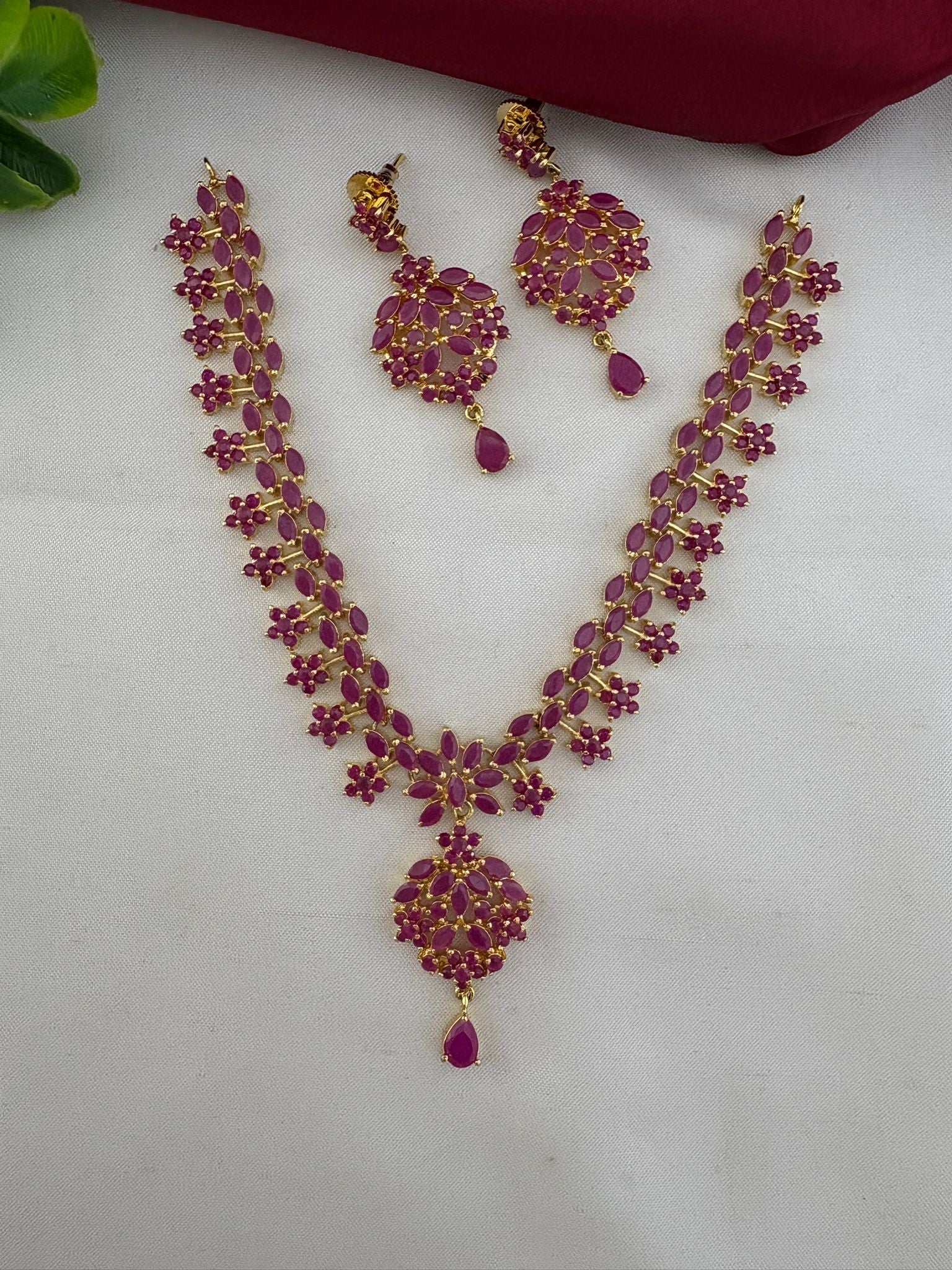 Main view of FeelOri Temple Design Ruby-Tone CZ Short Necklace Set with earrings - Authentic Craft by feelori.