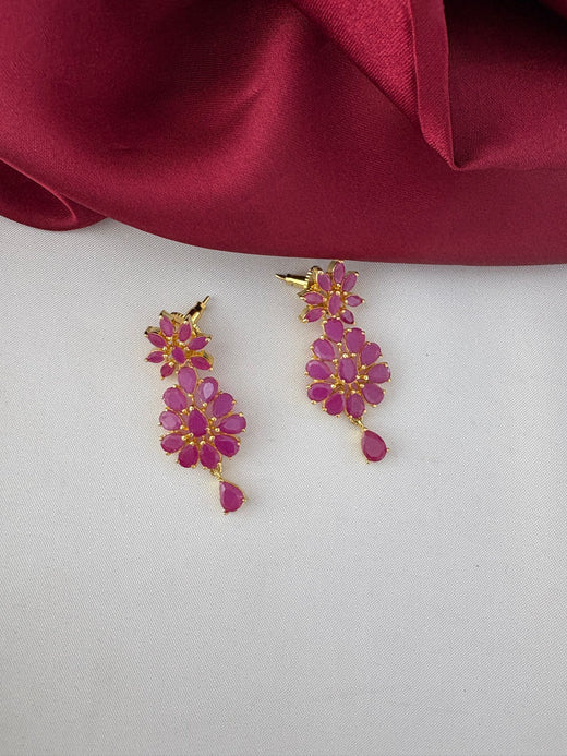 Close-up of FeelOri Traditional Ruby-Tone CZ Earrings featuring intricate ethnic design, part of the short necklace set.