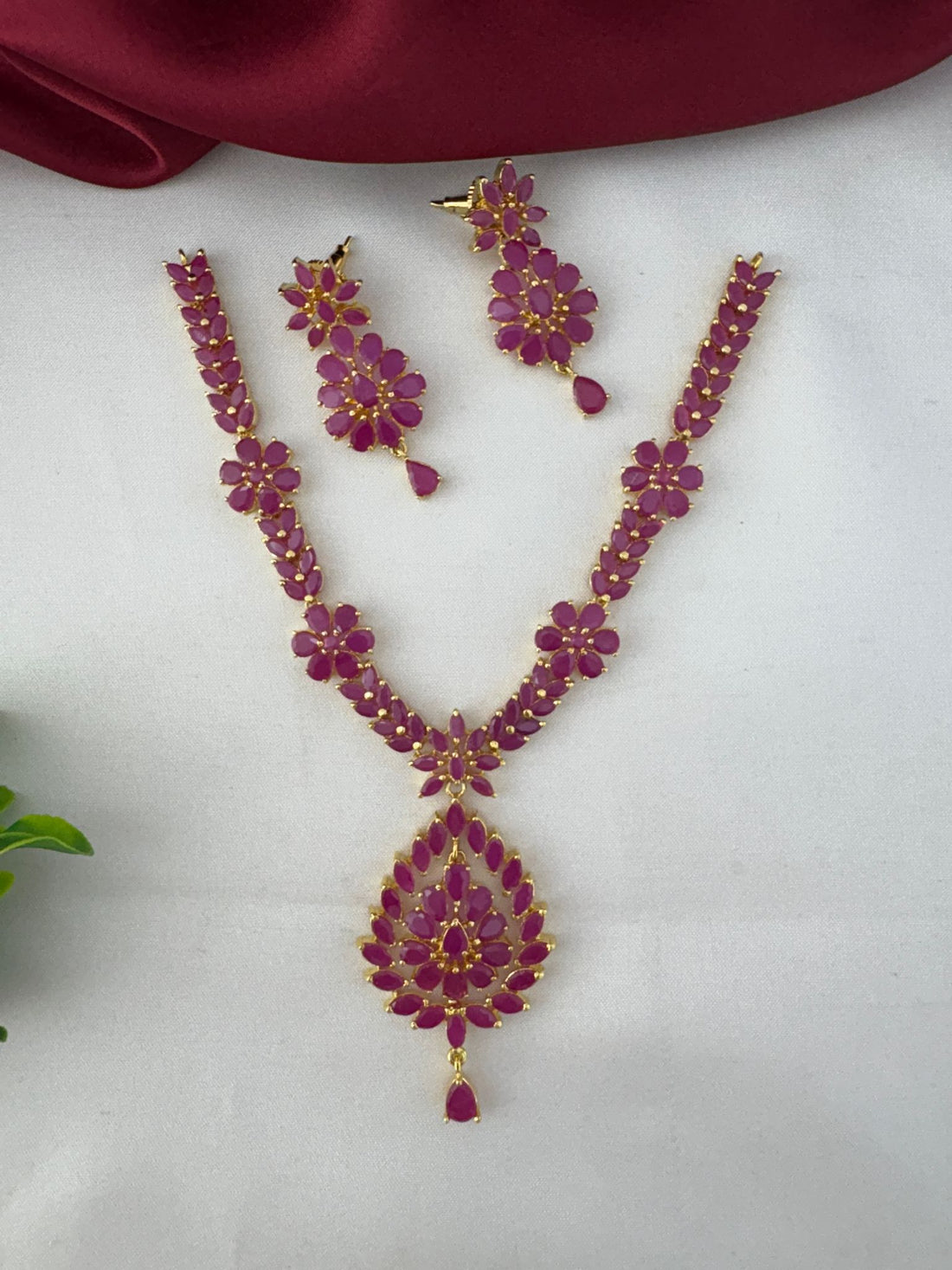 FeelOri Traditional Ruby-Tone CZ Short Necklace Set with matching earrings, showcasing ethnic charm.