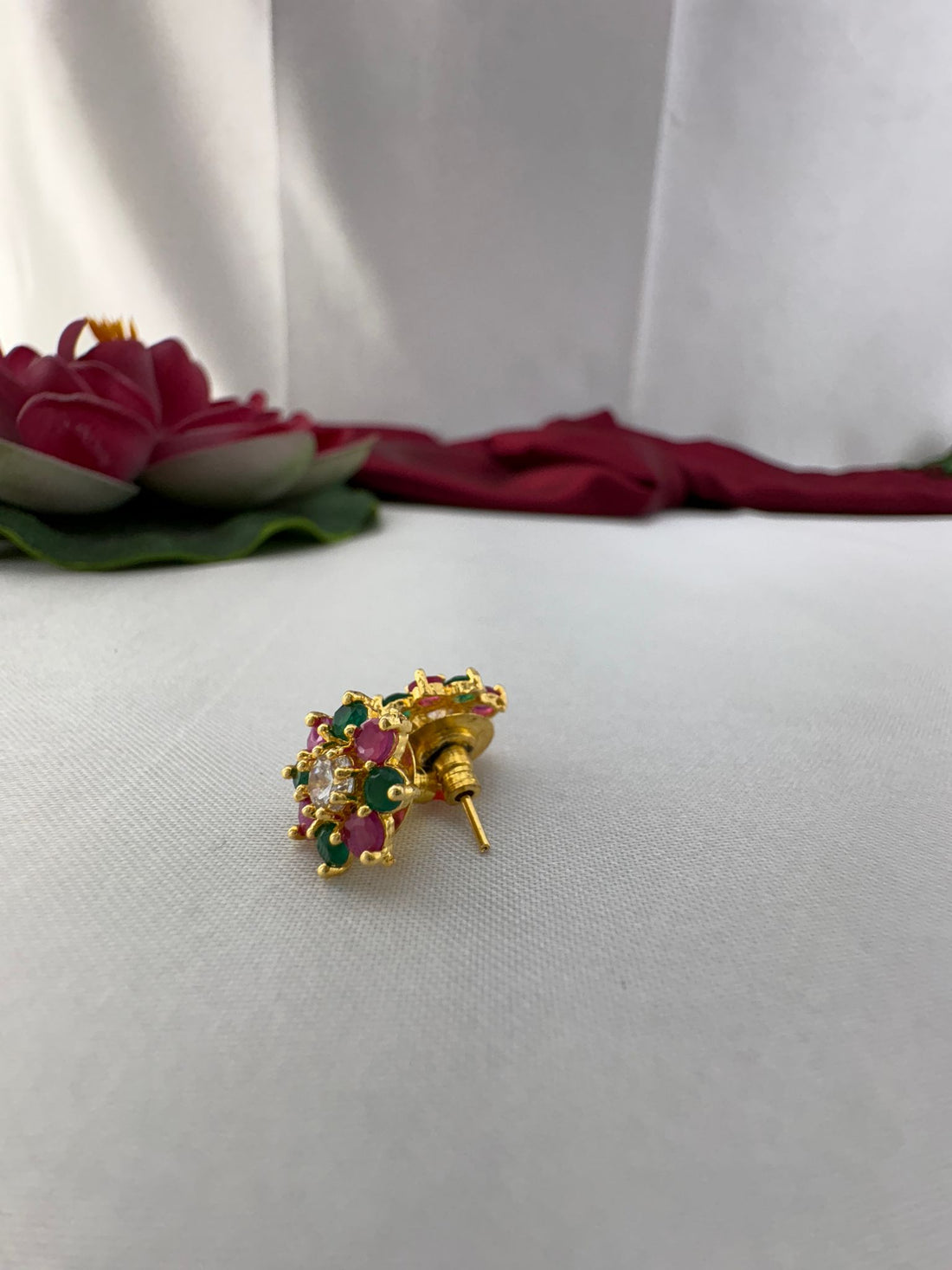 FeelOri Tropical Punch bright bold multi-color AD studs angled view displaying gold post and back mechanism