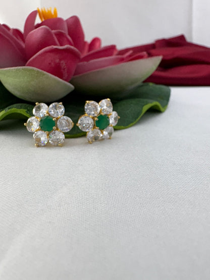 FeelOri white and green AD stud earrings styled with lotus creating timeless evergreen color palette appeal
