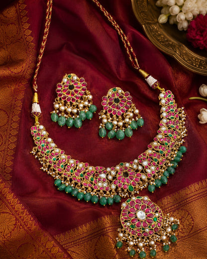FeelOri floral panel bridal-style jadau kundan necklace set with matching earrings styled with saree fabric